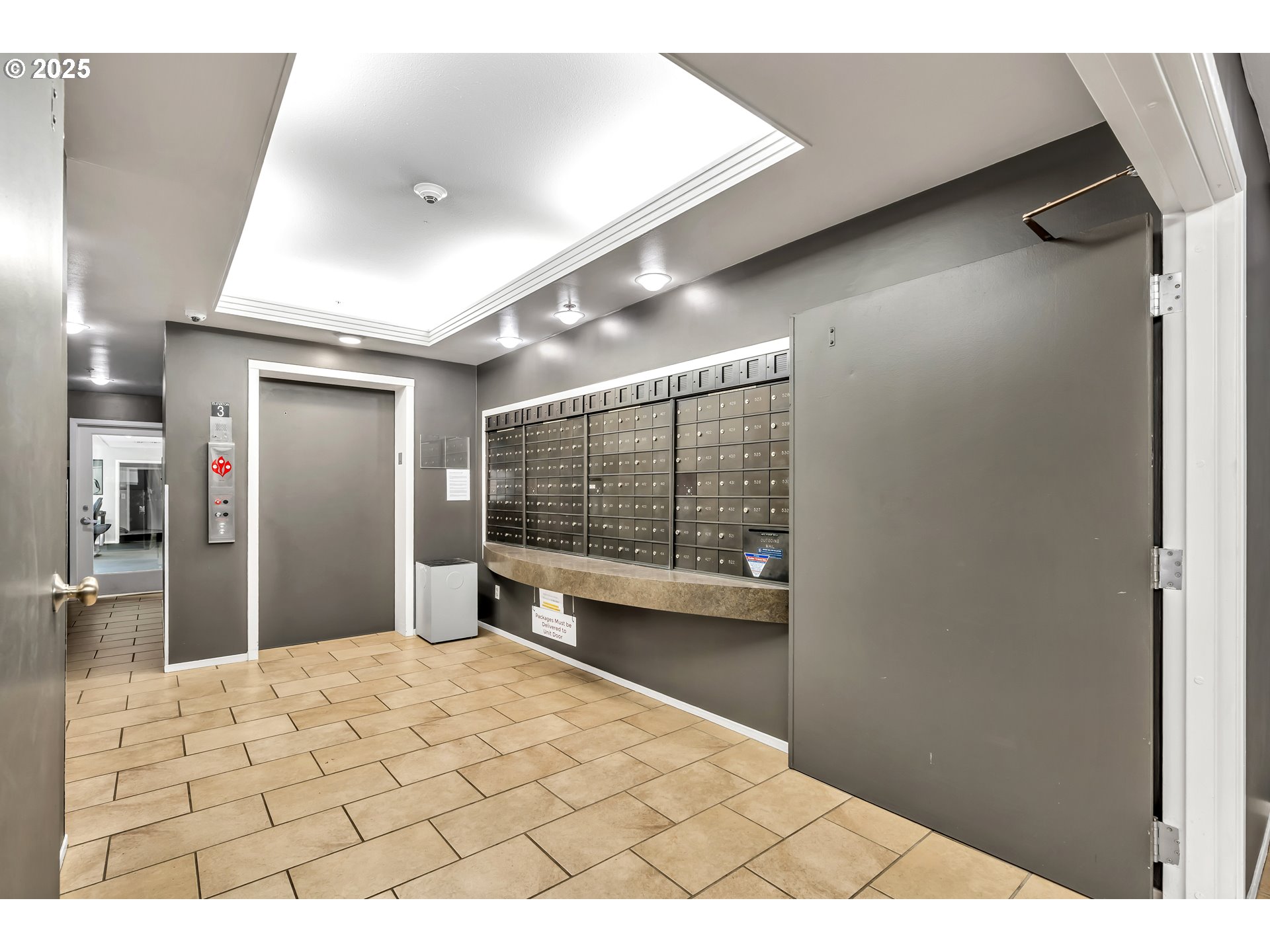 1500 Southwest Park Avenue, Unit 232 Portland, OR 97201 - Photo 9 of 40 a view of a hallway with a large window