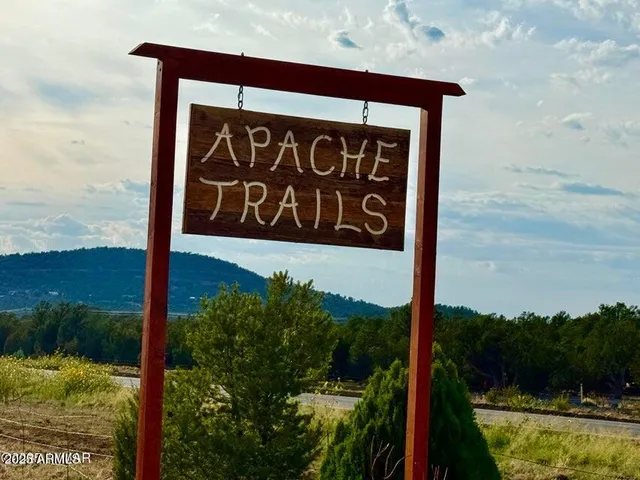 a sign broad on the side of the road