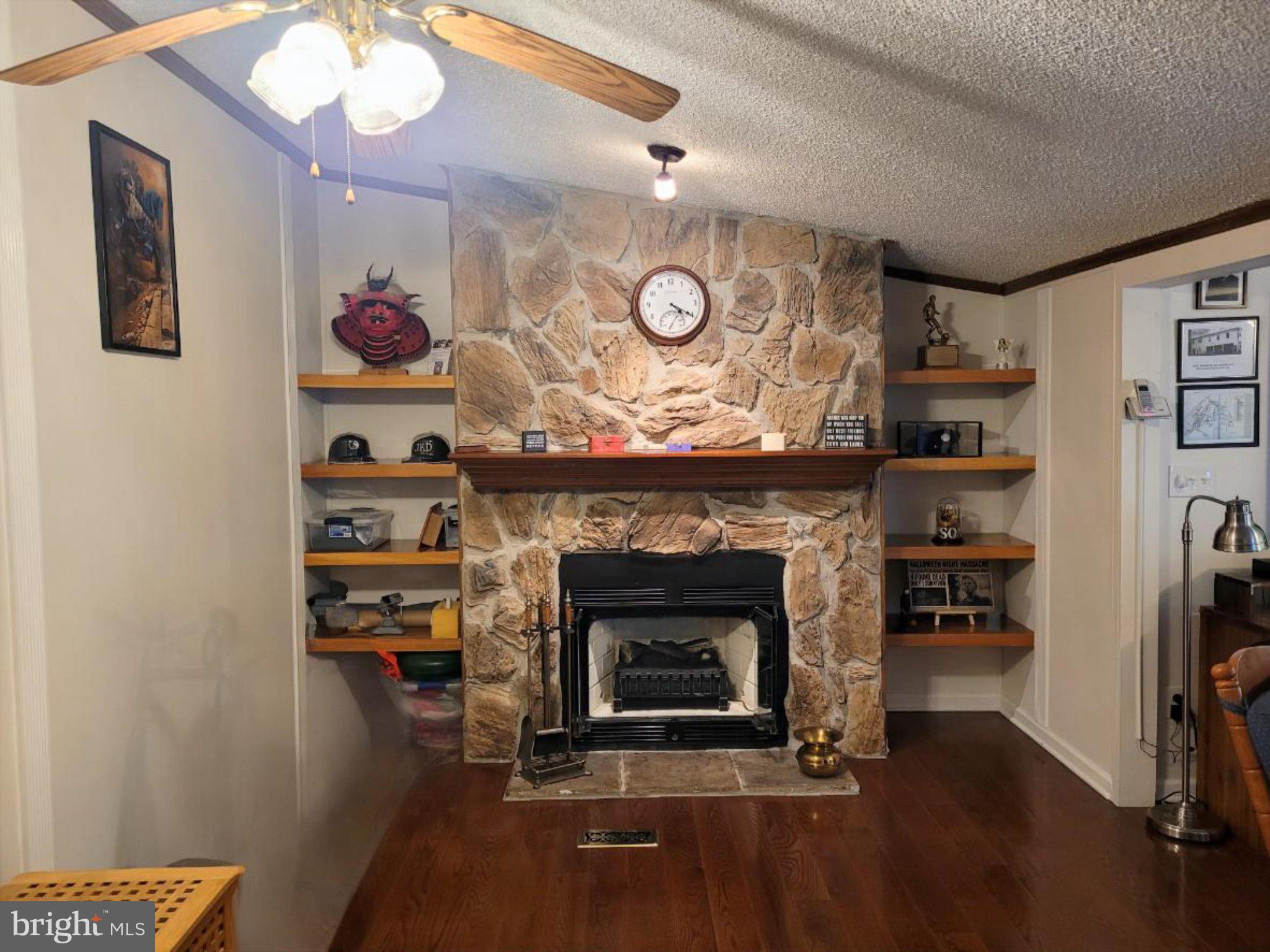 1729 Colora Road Colora, MD 21917 - Photo 8 of 21 Cozy living space with stone fireplace.