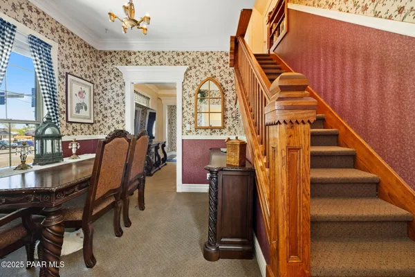 a view of a dining room with furniture