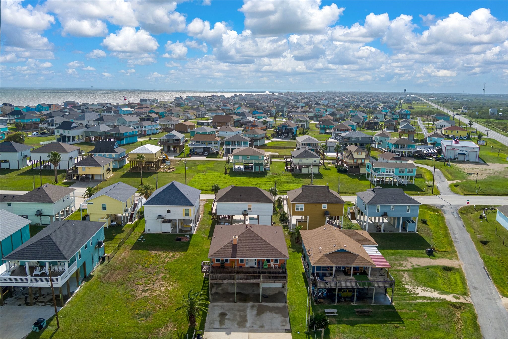 an aerial view of a house with a swimming pool yard and outdoor seating