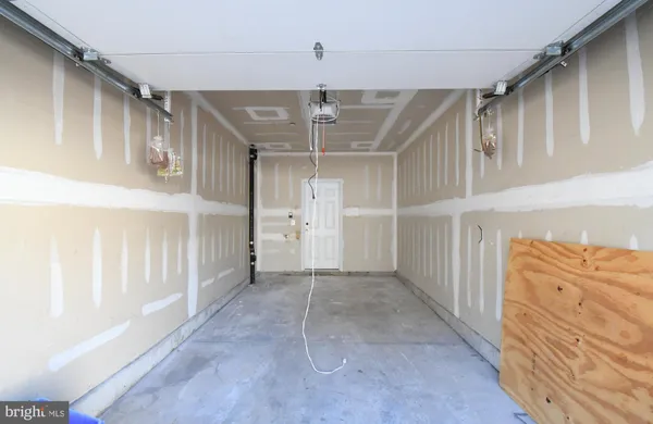 a view of a hallway with staircase