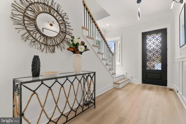 a view of entryway with wooden floor