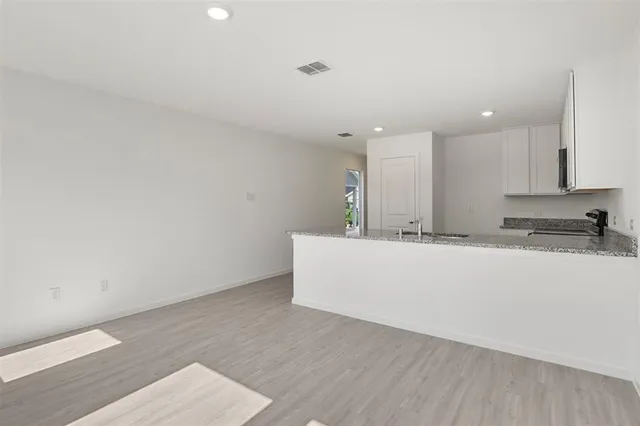 an empty room with an entryway