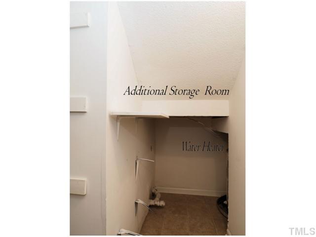 4300 Hunters Club Drive Raleigh, NC 27606 - Photo 12 of 19 Under the Stairs Extra Storage!