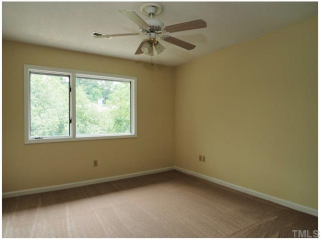 4300 Hunters Club Drive Raleigh, NC 27606 - Photo 17 of 19 All Bedrooms have new paint, new carpet and over sized windows for natural light!
