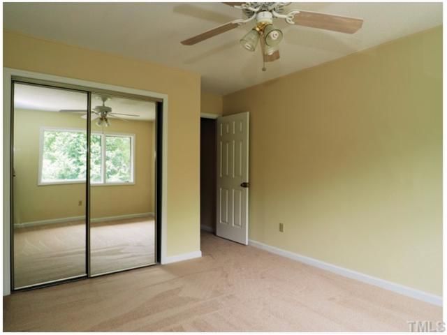 4300 Hunters Club Drive Raleigh, NC 27606 - Photo 10 of 19 Another Upstairs Bedroom with Ceiling Fan and Mirrored Sliding Closet Doors! Freshly Painted and New Carpet!