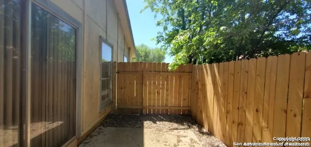 a view of a wooden fence