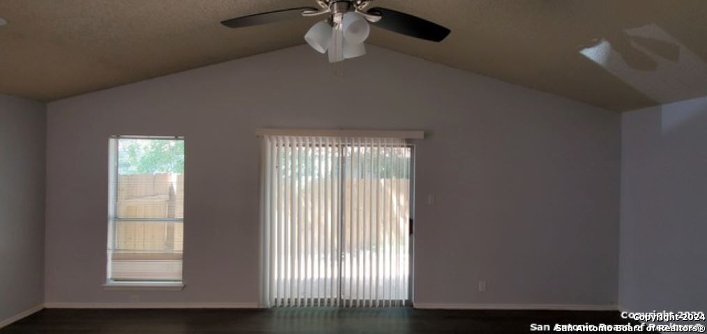 5236 Meadow Rise Street San Antonio, TX 78250 - Photo 4 of 25 a view of an empty room with a window