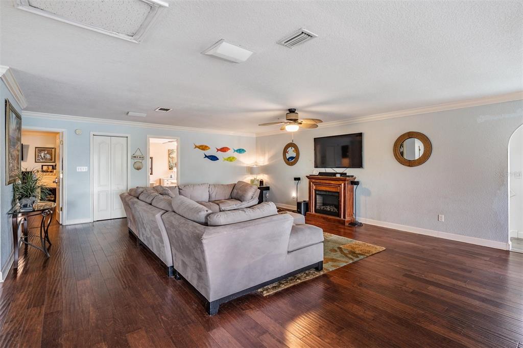 815 2nd Avenue Northwest Ruskin, FL 33570 - Photo 16 of 86 a living room with furniture and wooden floor
