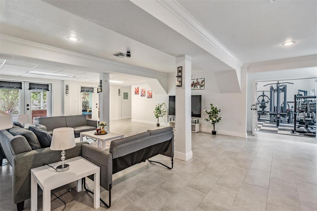 815 2nd Avenue Northwest Ruskin, FL 33570 - Photo 34 of 86 a living room with furniture and wooden floor