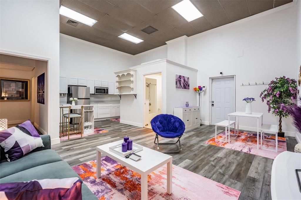 815 2nd Avenue Northwest Ruskin, FL 33570 - Photo 42 of 86 a living room with furniture a rug and a table