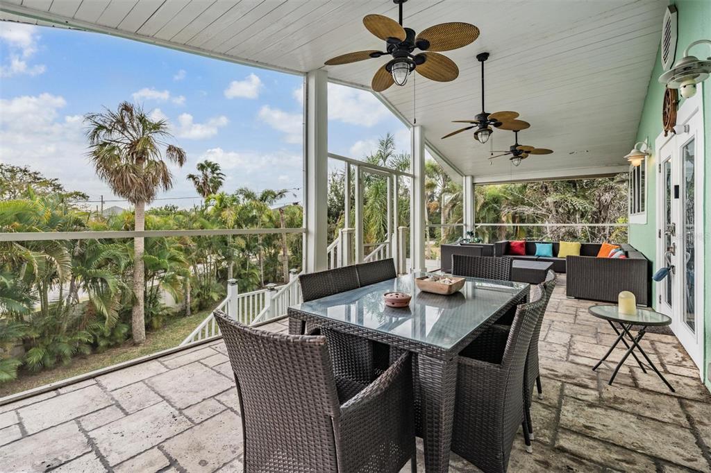 815 2nd Avenue Northwest Ruskin, FL 33570 - Photo 5 of 86 a dining room with furniture and a floor to ceiling window