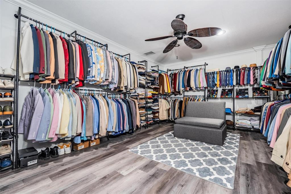 815 2nd Avenue Northwest Ruskin, FL 33570 - Photo 54 of 86 a view of a living room with clothes and shoes