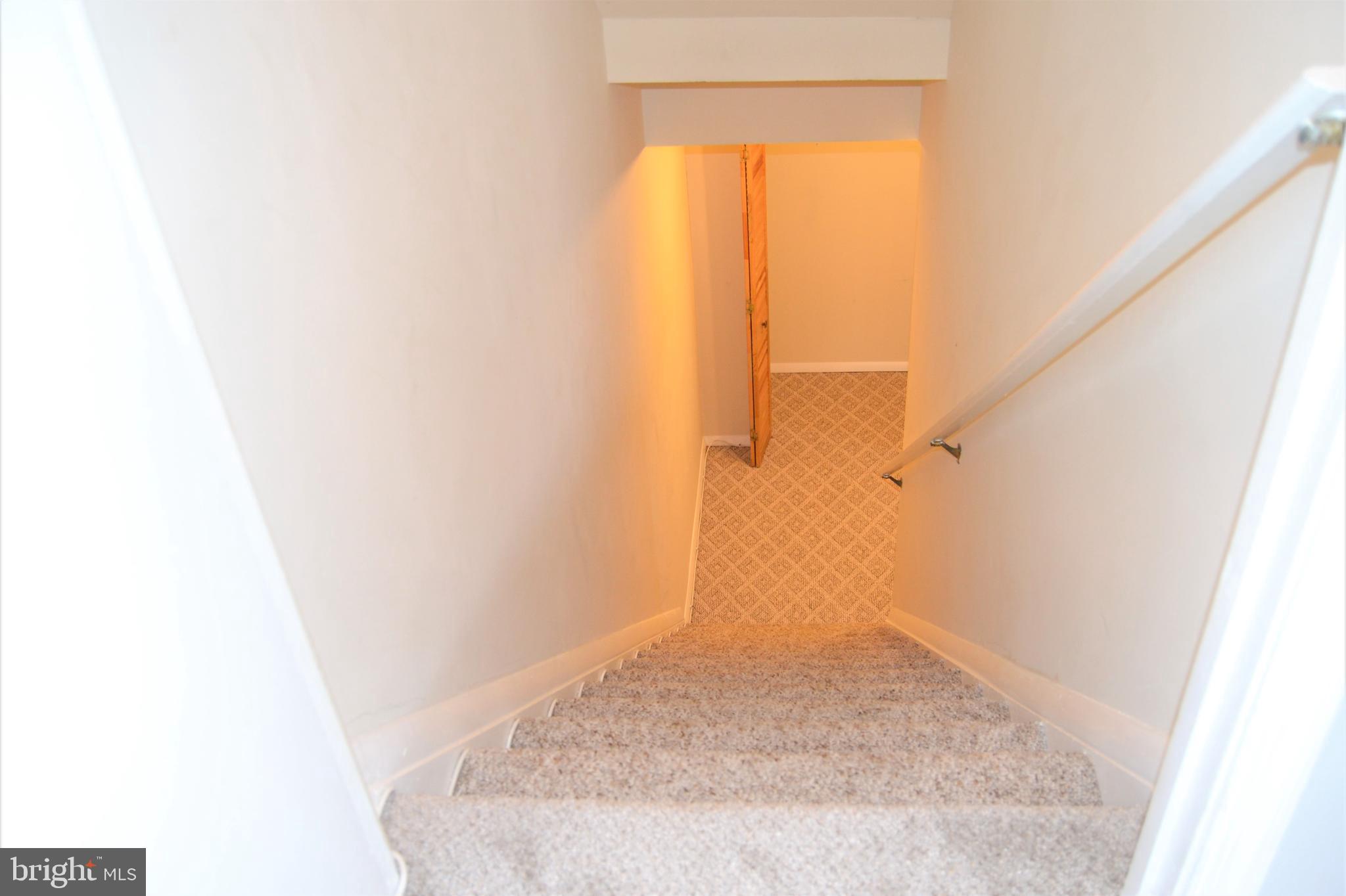 6952 Rockfield Road Baltimore, MD 21244 - Photo 16 of 40 Down to finished basement