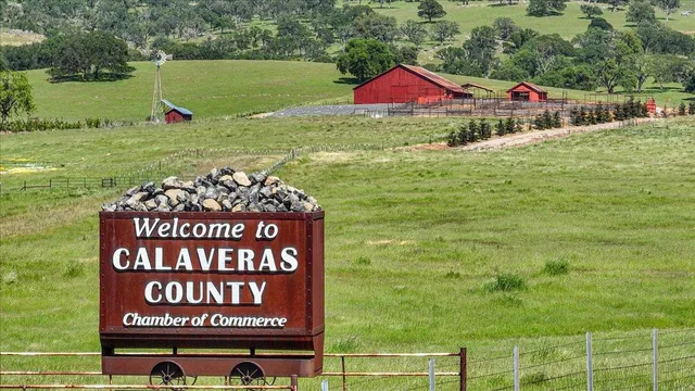 a view of a park with a car park in the back