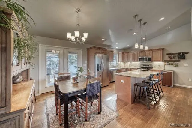 a view of a dining room with furniture