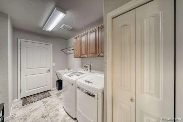 a bedroom with bed and a window