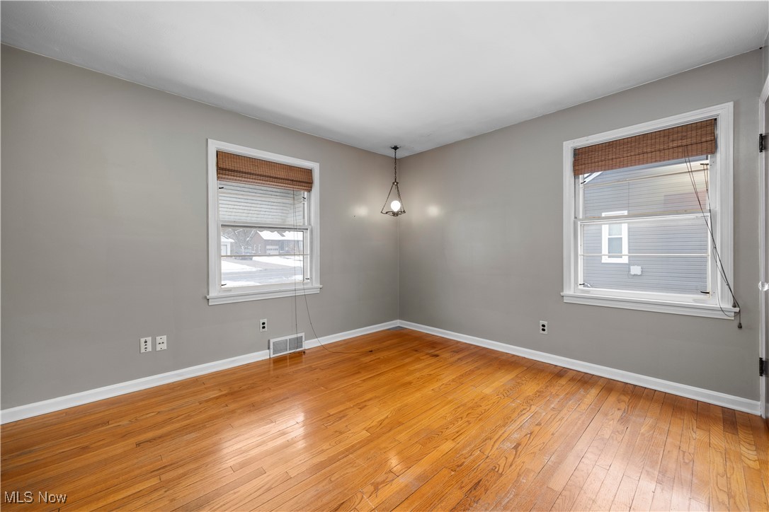 25950 Bagley Road Olmsted Falls, OH 44138 - Photo 19 of 32 Empty room with light wood-style floors and baseboards