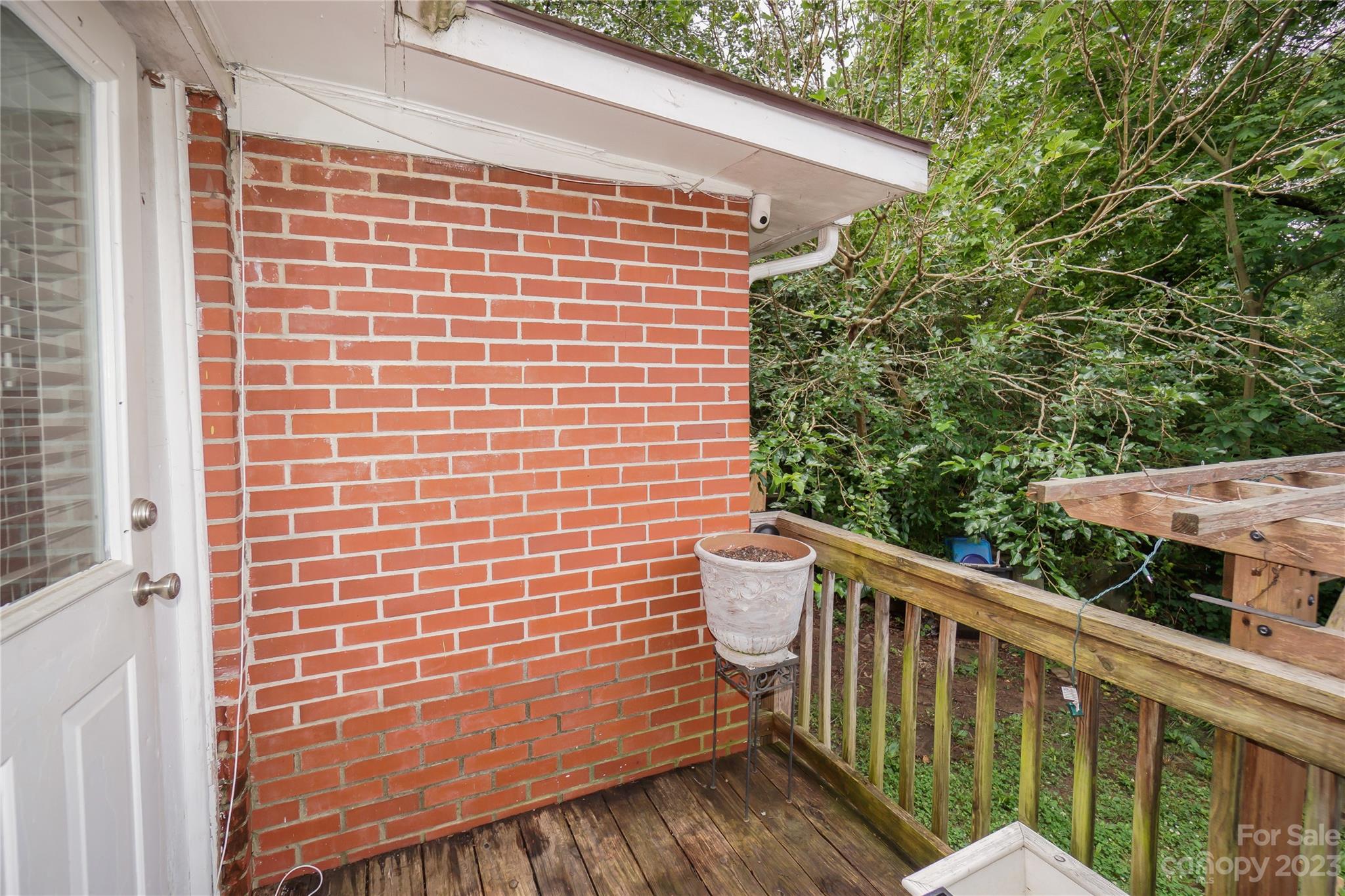 720 Flint Street Rock Hill, SC 29730 - Photo 15 of 20 a view of a brick wall and floor to ceiling window