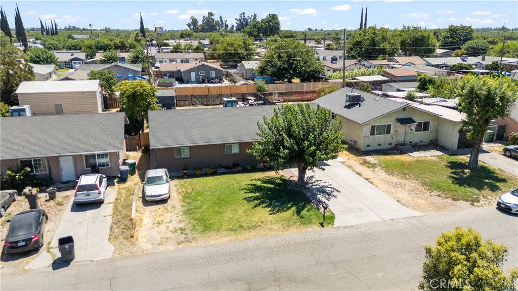 2129 Hudson Avenue Merced, CA 95348 - Photo 26 of 35 an aerial view of a house with a yard and lake view