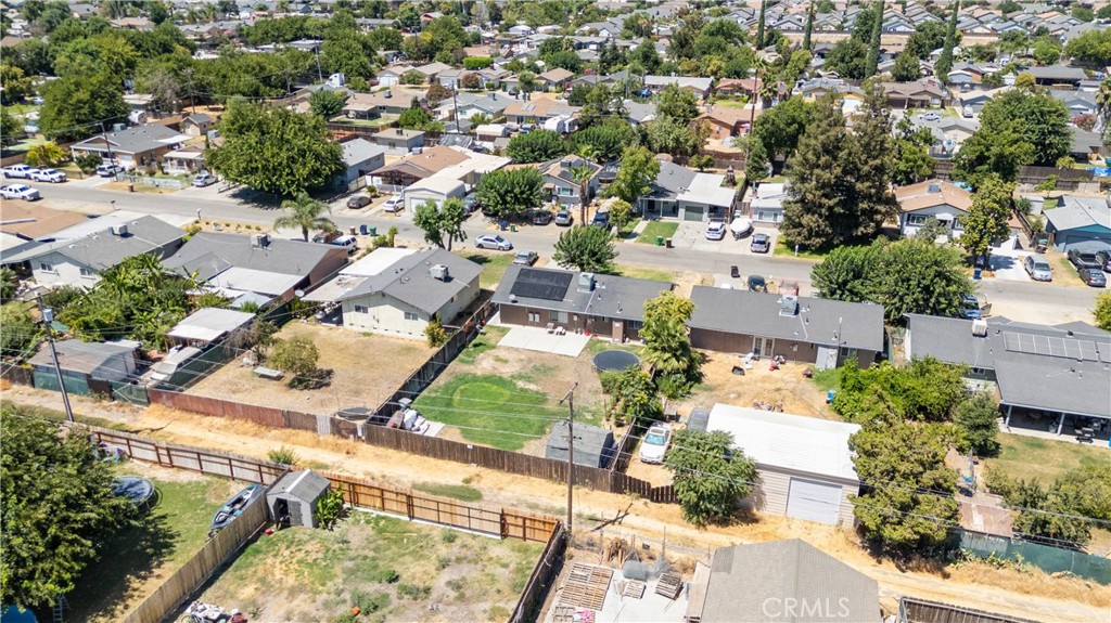 2129 Hudson Avenue Merced, CA 95348 - Photo 28 of 35 an aerial view of residential houses with outdoor space