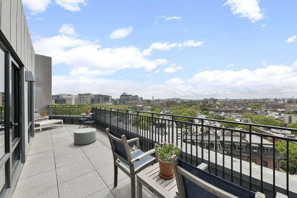 505 Tremont Street, Unit 904 Boston, MA 02116 - Photo 4 of 16 a view of a terrace with furniture
