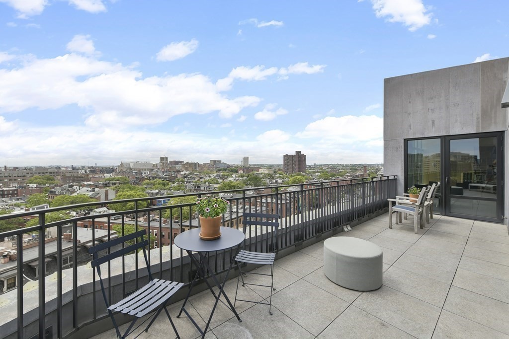505 Tremont Street, Unit 904 Boston, MA 02116 - Photo 5 of 16 a view of a terrace with furniture