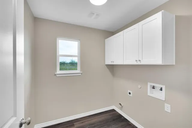 a view of small space with wooden floor