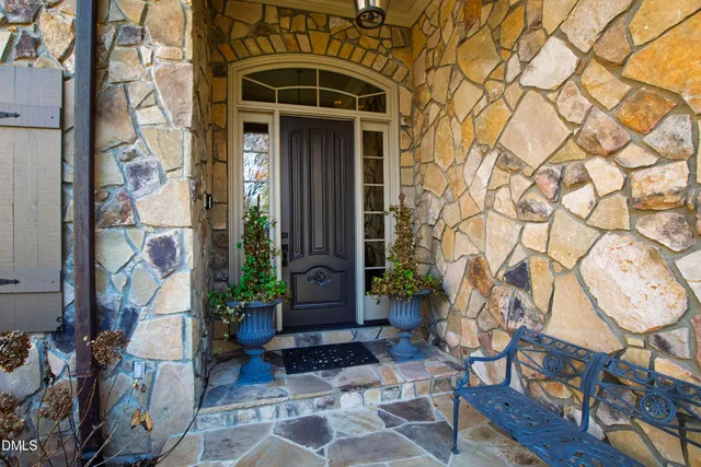 a kitchen with stainless steel appliances granite countertop a stove and a sink