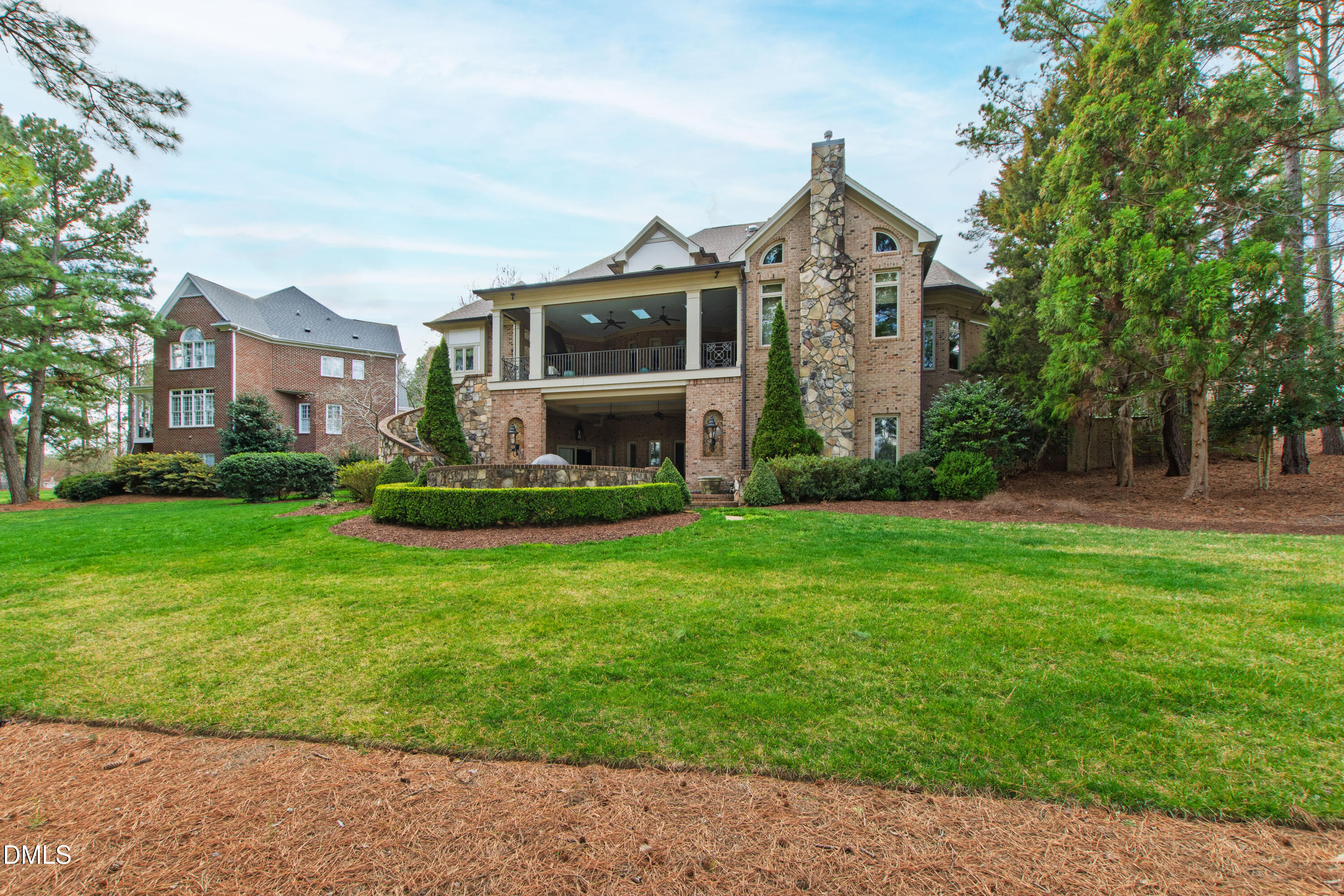 12345 Richmond Run Drive Raleigh, NC 27614 - Photo 16 of 98 a front view of a house with a garden and plants
