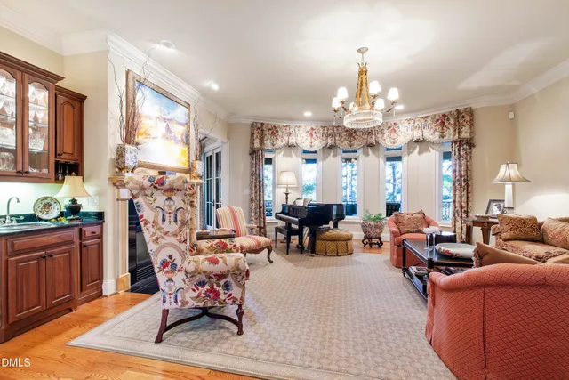 a kitchen with stainless steel appliances a stove a sink and a microwave
