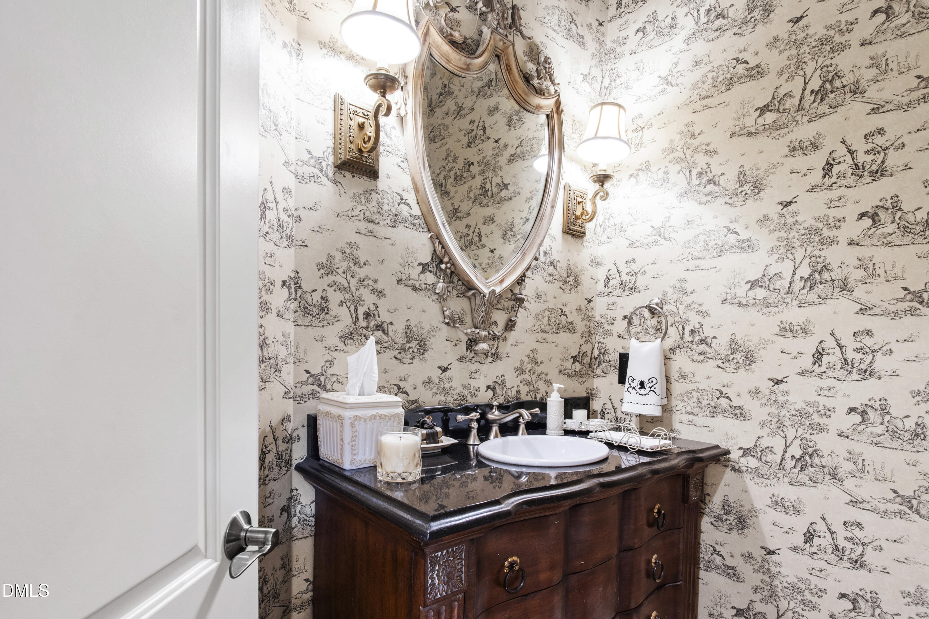 12345 Richmond Run Drive Raleigh, NC 27614 - Photo 24 of 90 a bathroom with a sink and a mirror