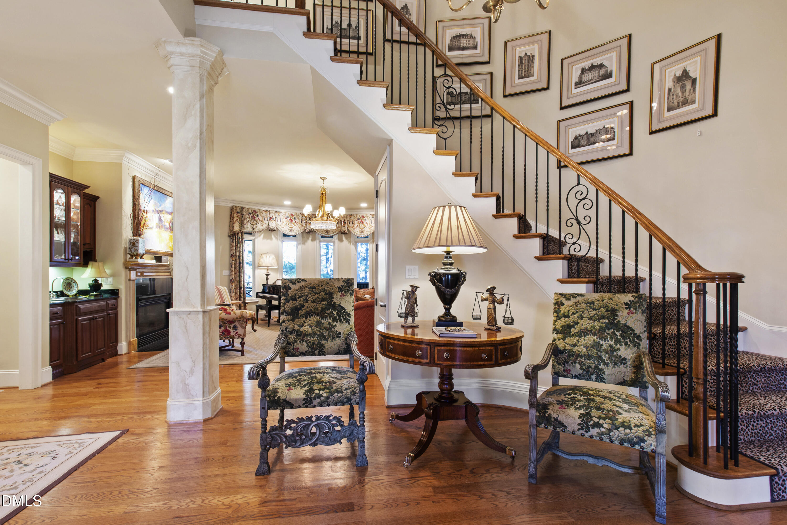 12345 Richmond Run Drive Raleigh, NC 27614 - Photo 24 of 98 a view of entryway dining room and hall with wooden floor