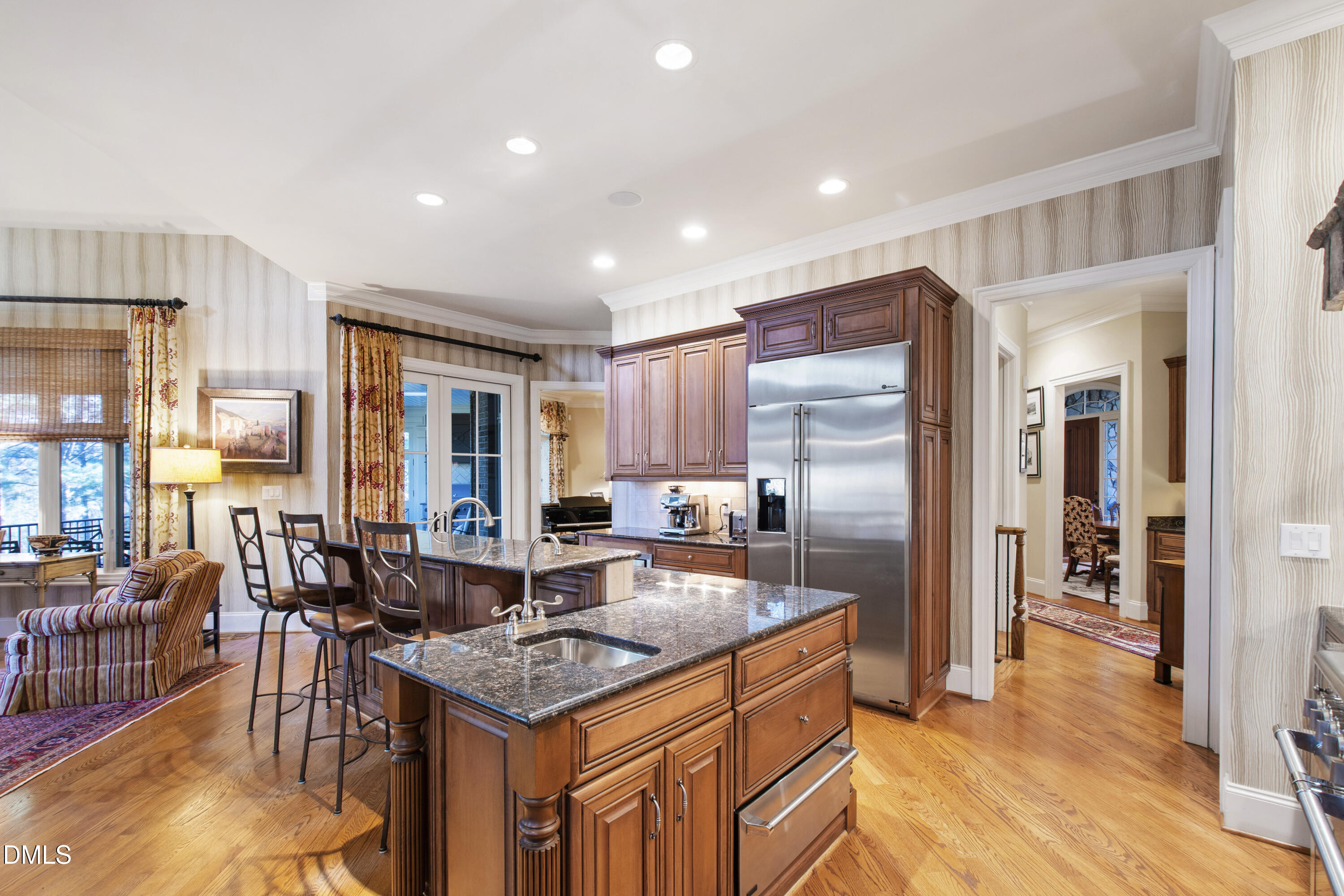 12345 Richmond Run Drive Raleigh, NC 27614 - Photo 28 of 90 a kitchen with granite countertop lots of counter top space and stainless steel appliances