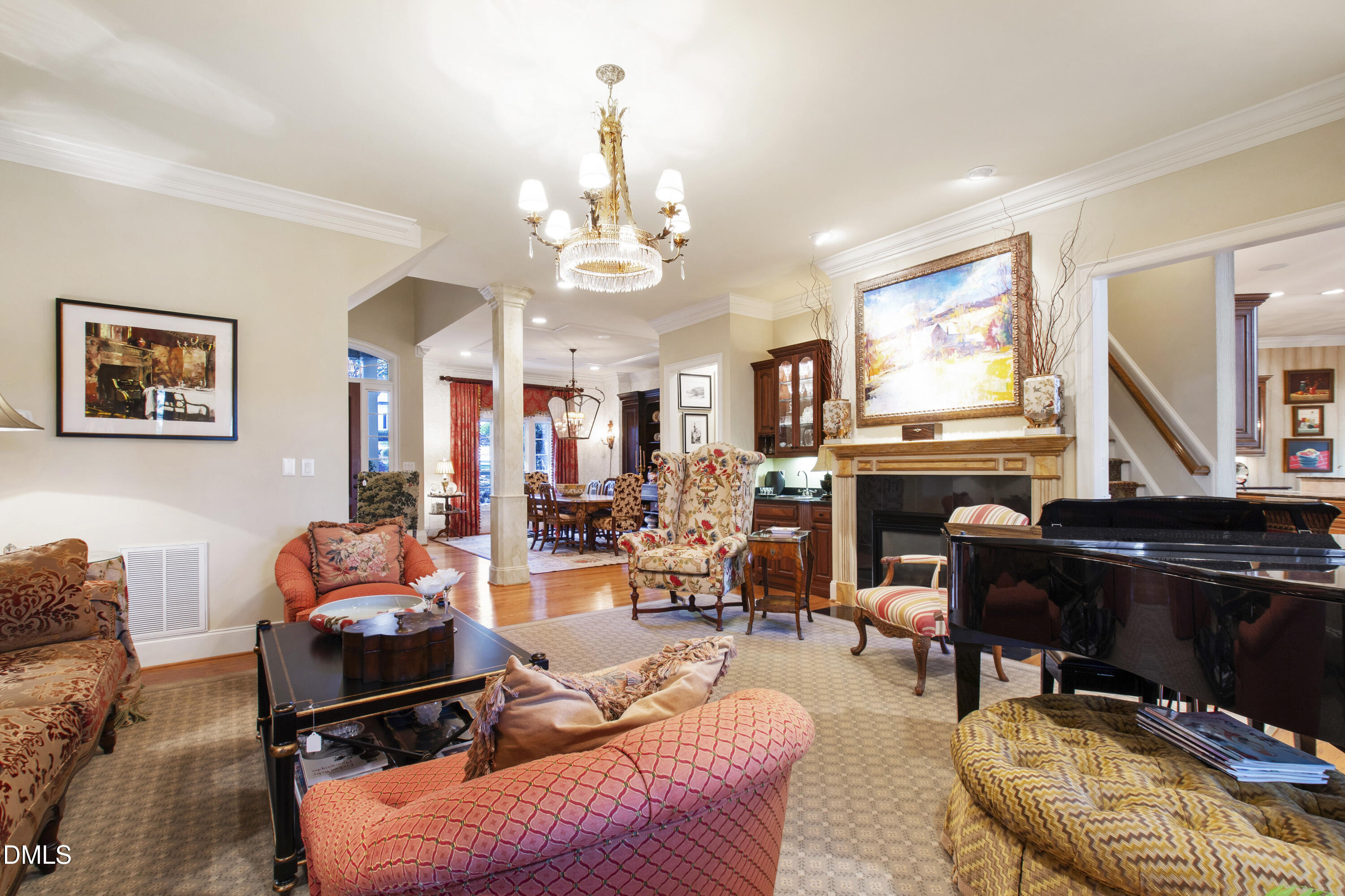 12345 Richmond Run Drive Raleigh, NC 27614 - Photo 30 of 98 a living room with furniture fireplace and a chandelier