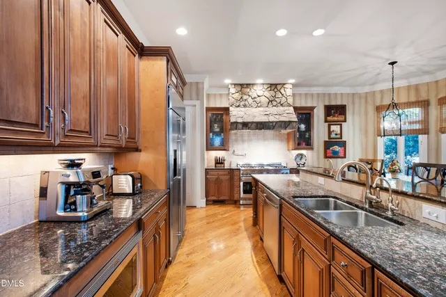 a white bath tub sitting in a bathroom next to a window