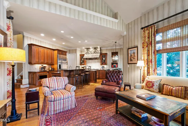 a view of a livingroom with furniture and a fireplace
