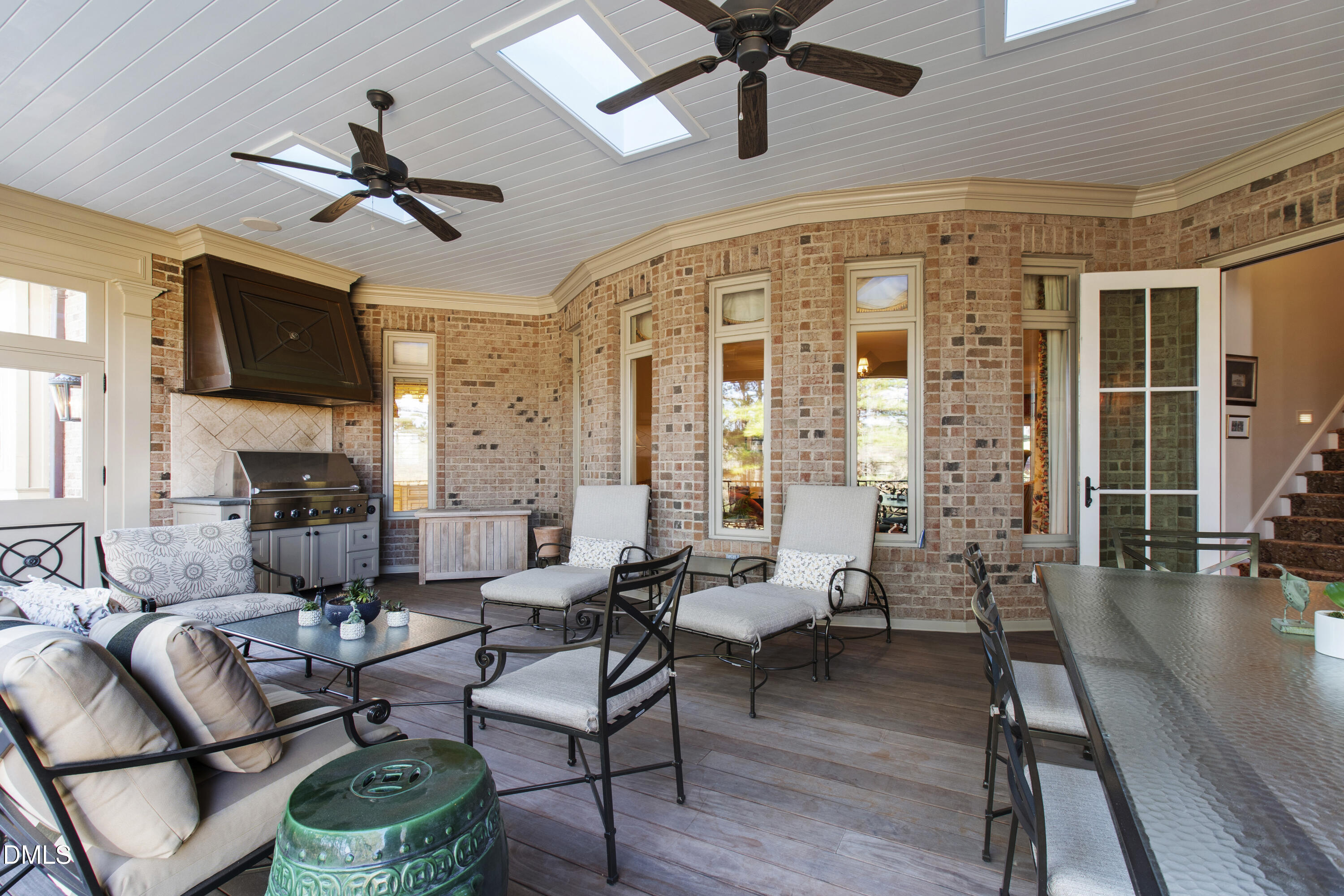 12345 Richmond Run Drive Raleigh, NC 27614 - Photo 35 of 90 a living room with furniture a ceiling fan and a large window