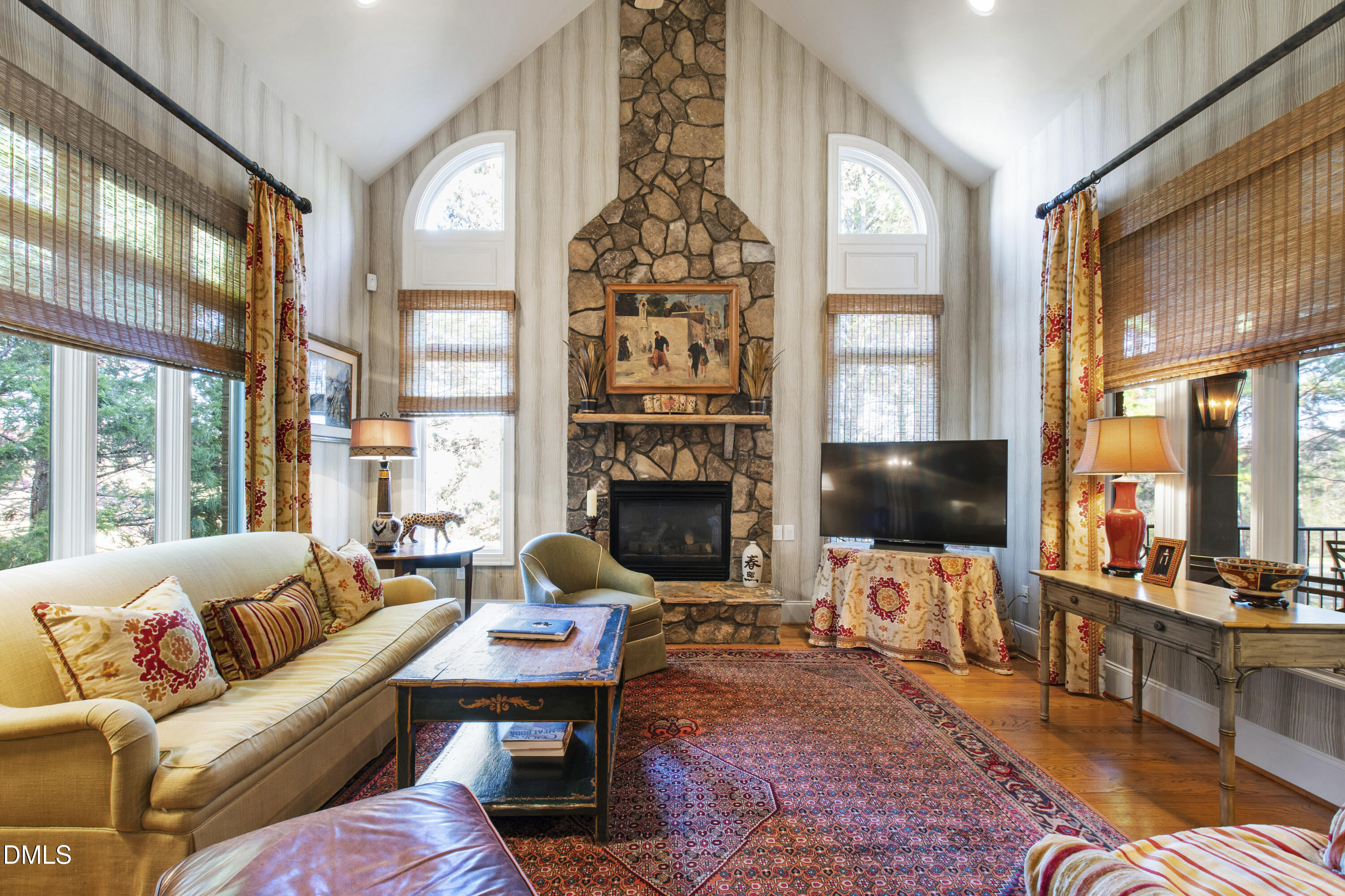 12345 Richmond Run Drive Raleigh, NC 27614 - Photo 40 of 98 a living room with furniture fireplace and flat screen tv