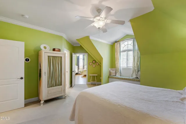 an aerial view of a house with garden space and patio