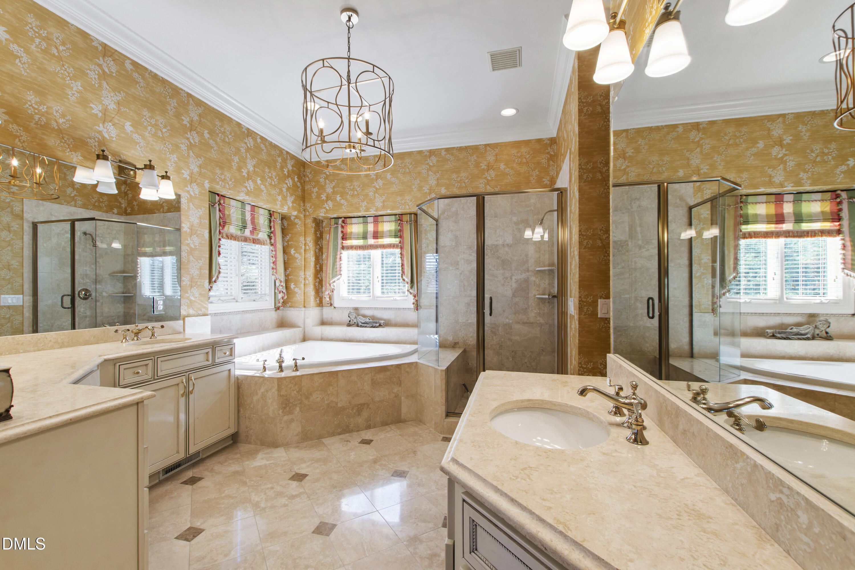 12345 Richmond Run Drive Raleigh, NC 27614 - Photo 50 of 98 a spacious bathroom with a sink a large mirror and a bathtub