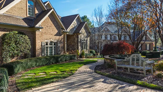 a view of a swimming pool with an outdoor seating