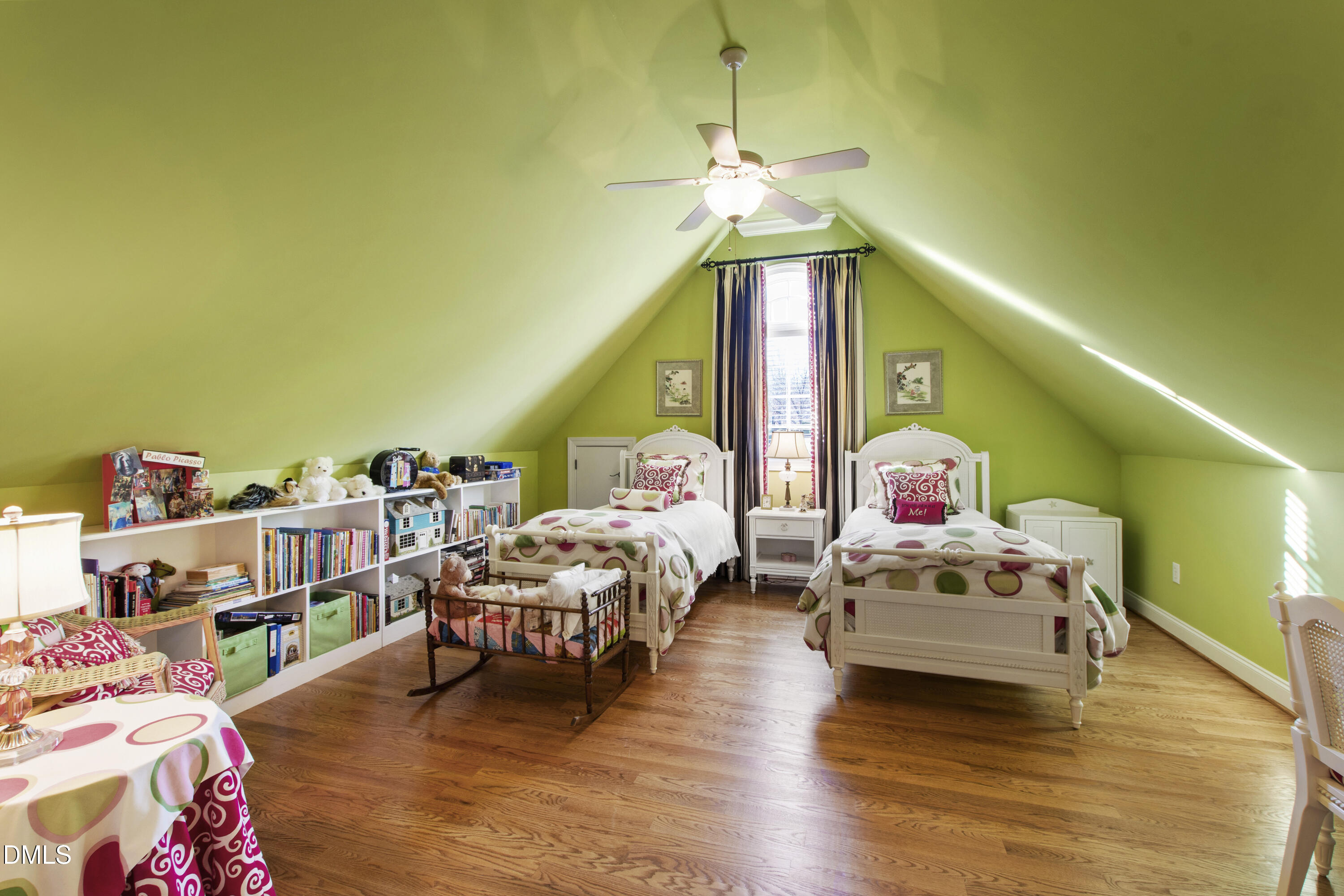 12345 Richmond Run Drive Raleigh, NC 27614 - Photo 55 of 98 a bedroom with a bed and wooden floor