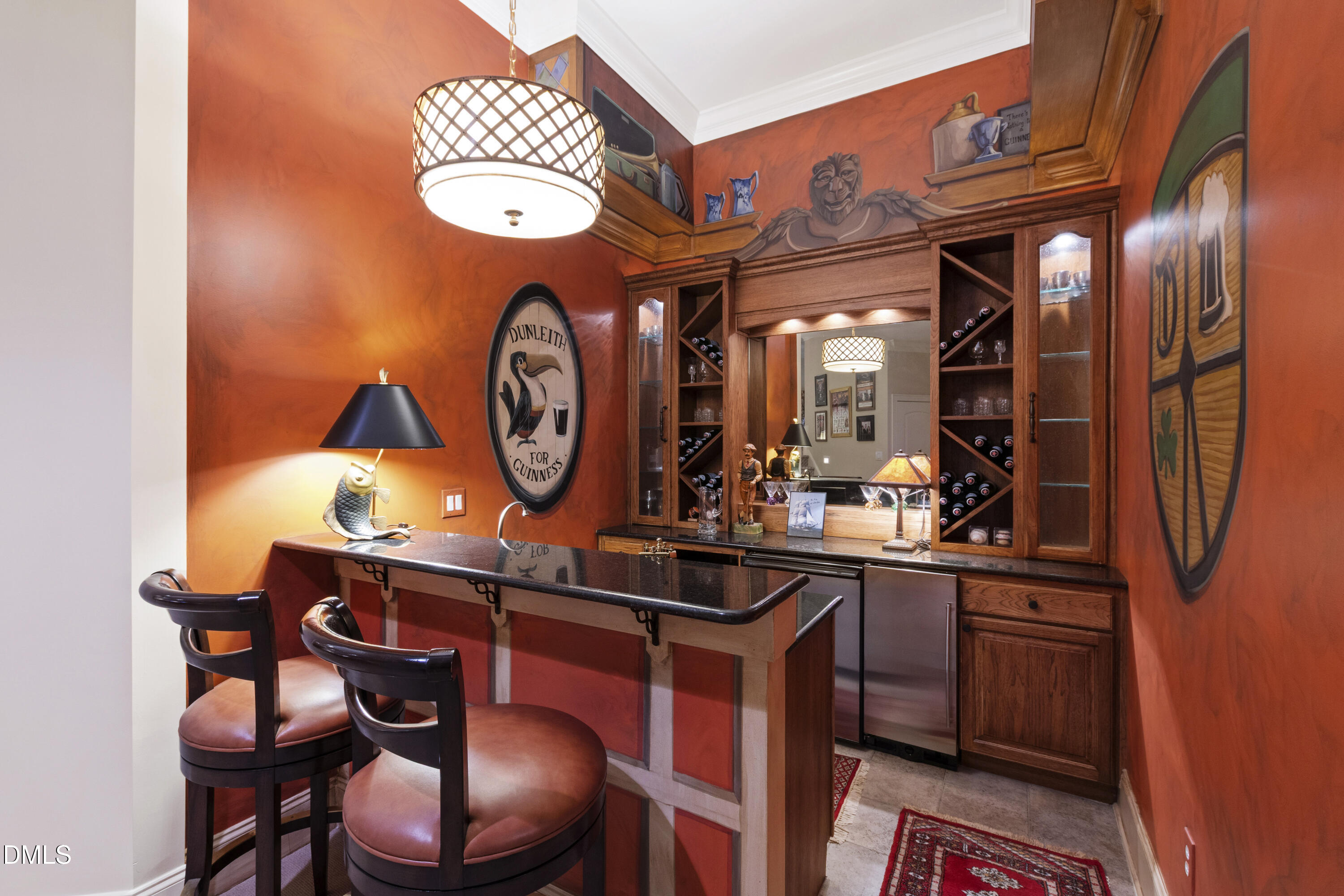 12345 Richmond Run Drive Raleigh, NC 27614 - Photo 66 of 98 a kitchen with a sink and a clock on the wall