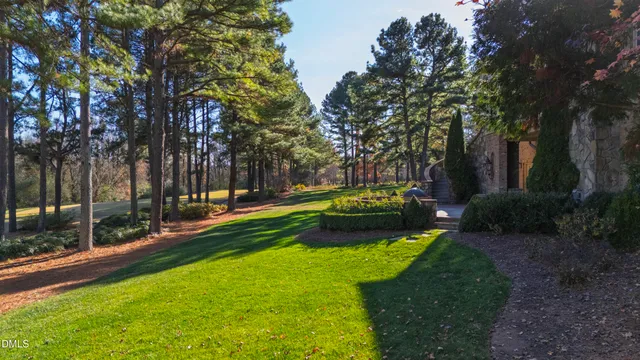 a view of entryway dining room and hall with wooden floor