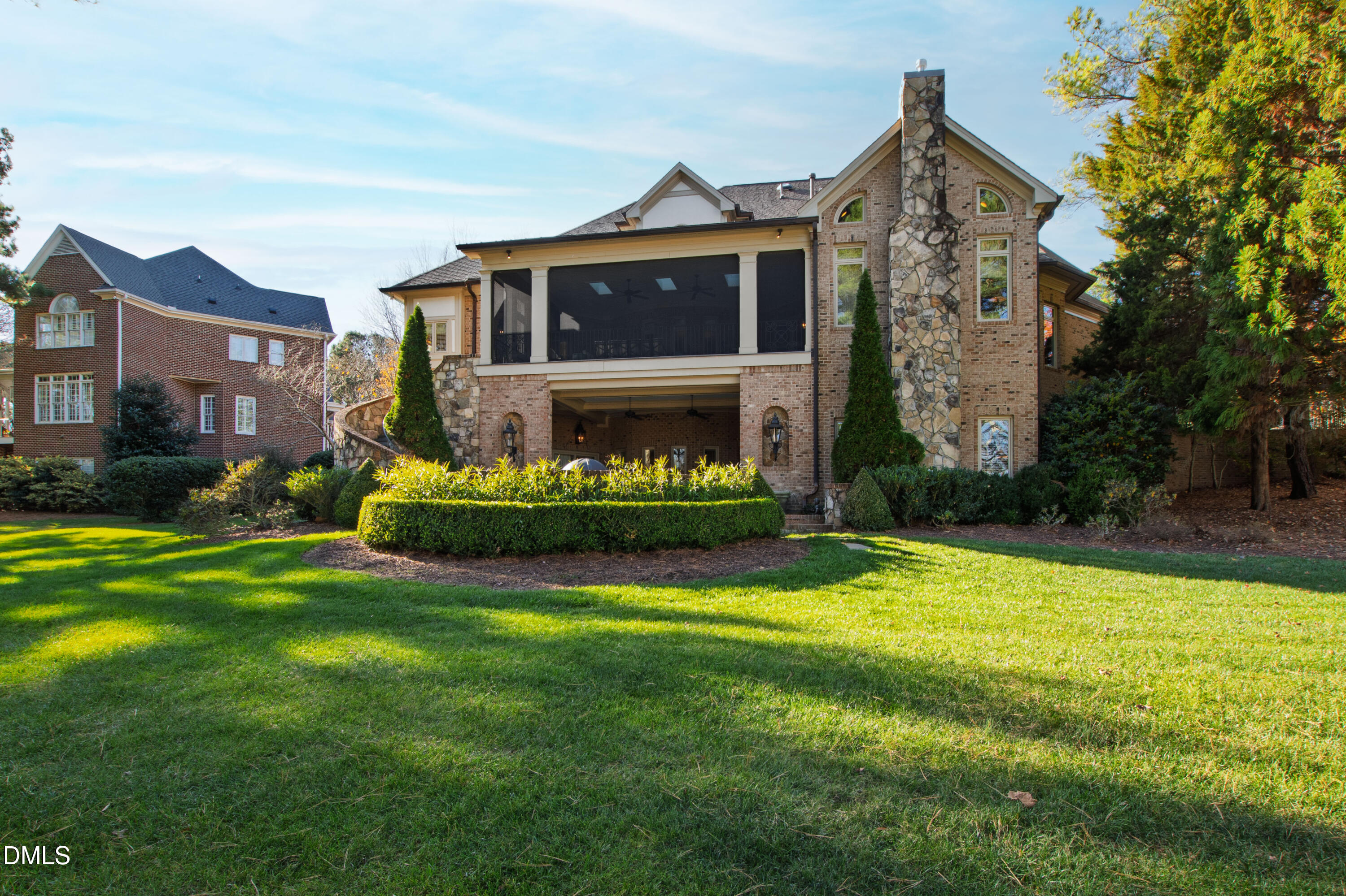 12345 Richmond Run Drive Raleigh, NC 27614 - Photo 83 of 98 a front view of a house with a garden and yard