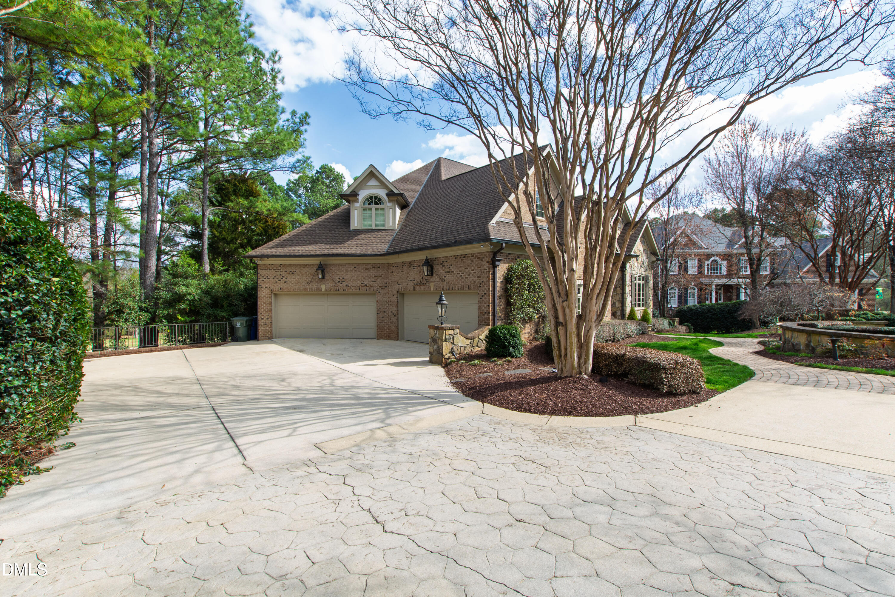 12345 Richmond Run Drive Raleigh, NC 27614 - Photo 9 of 98 a front view of a house with garden and trees