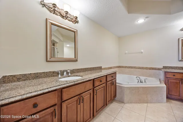 a view of a lake in between the two and trees