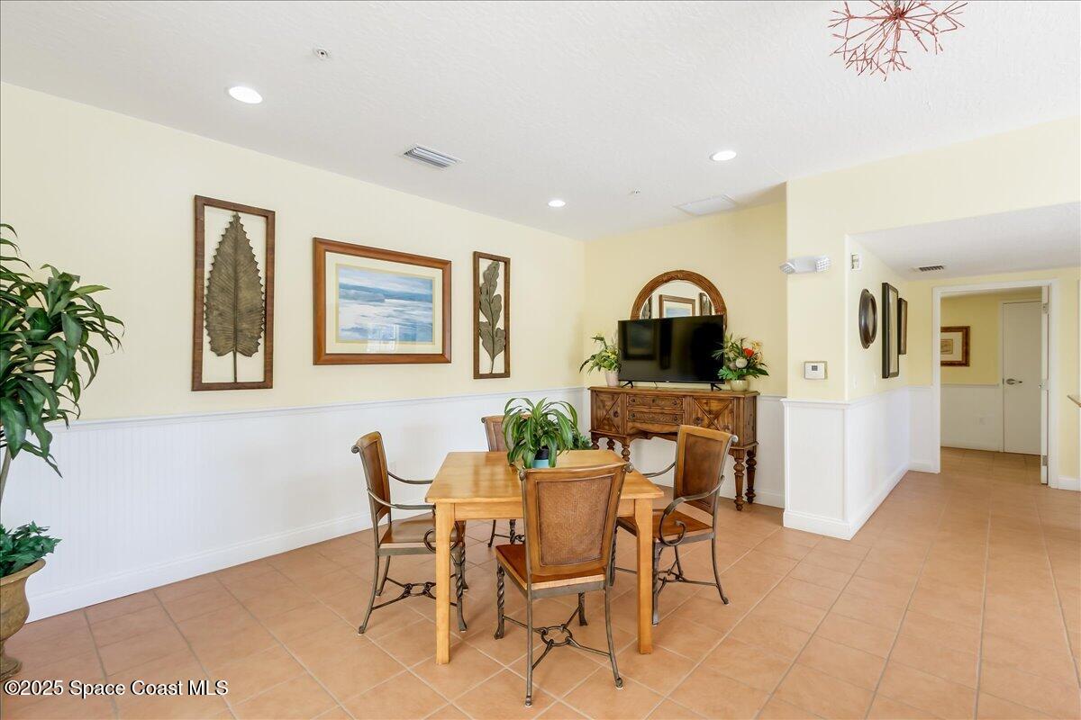 1 8th Avenue, Unit 1403 Indialantic, FL 32903 - Photo 3 of 69 a view of a dining room with furniture and wooden floor